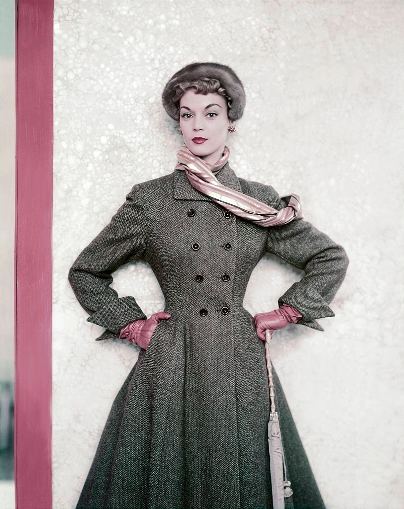 Jean Patchett wearing a tweed winter coat from the Paris Collections, 1951.