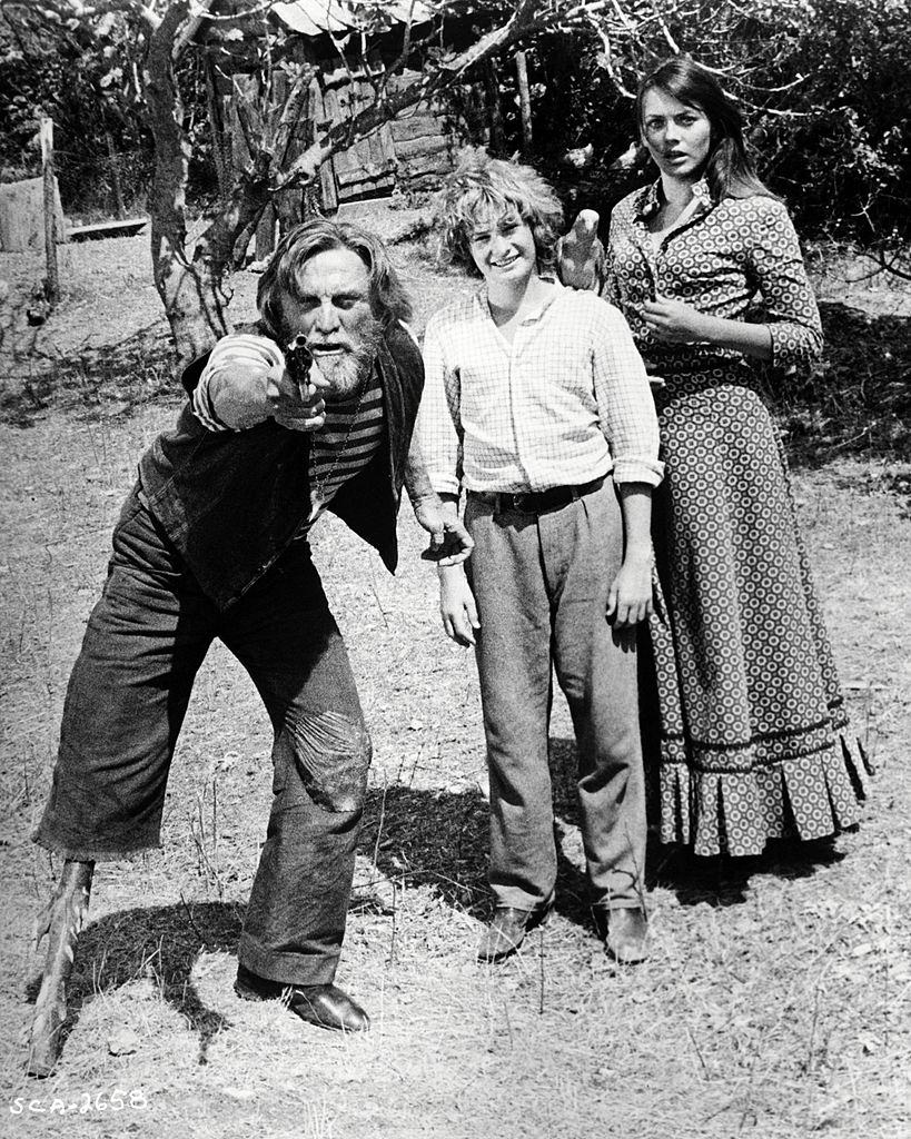 Lesley-Anne Down with Kirk Douglas and Mark Lester in 'Scalawag', 1973.