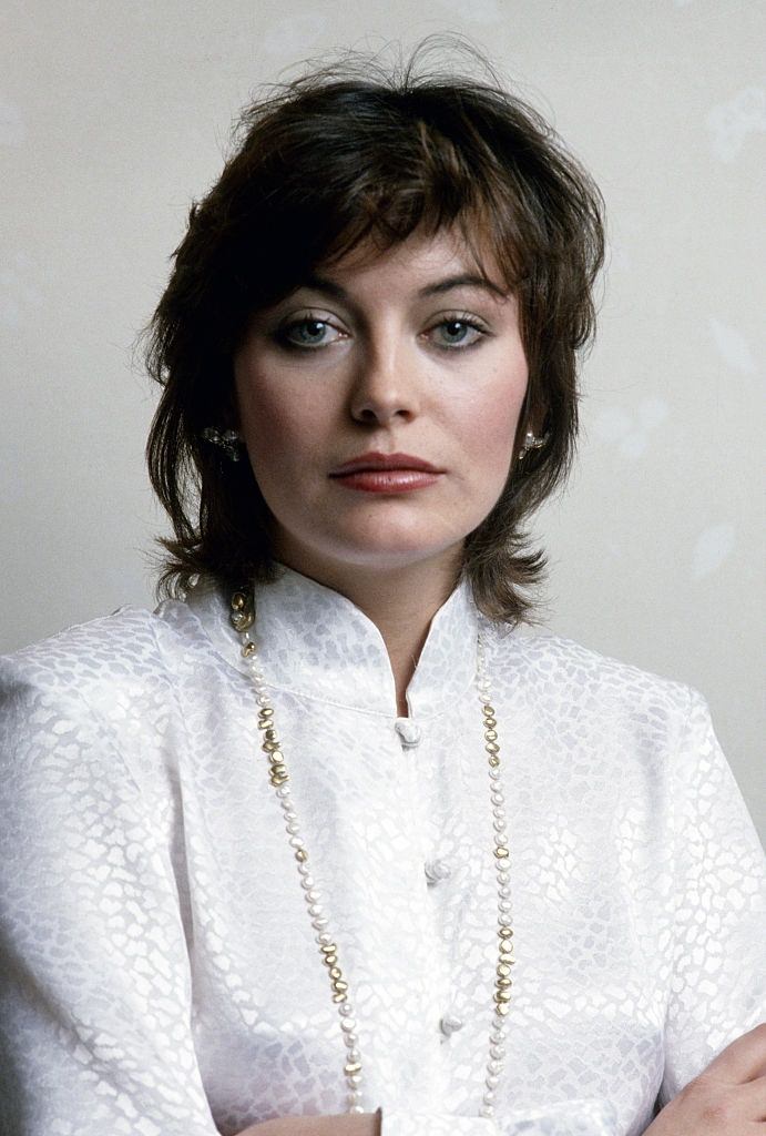 Lesley-Anne Down in white dress, 1979.