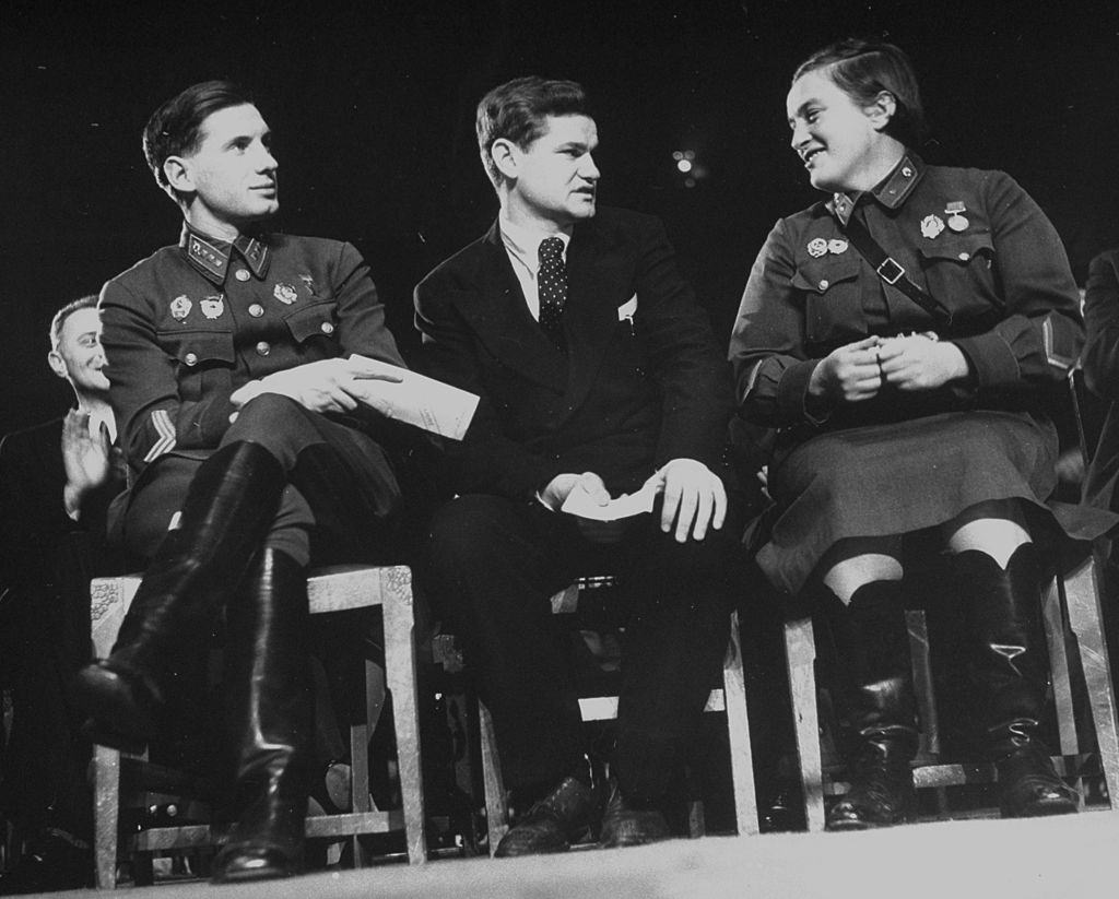 Lyudmila Pavlichenko talking with other Russian officers during celebration of Soviet Union's 25th anniversary, 1942.