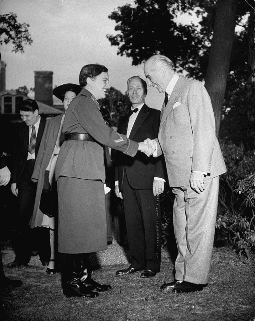 Lyudmila Pavlichenko shaking hands with Mr. Jones, 1942.