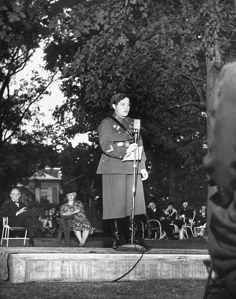 Lyudmila Pavlichenko addressing the guests at a party, 1942.