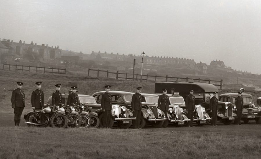 Officers and vehicles of the former Oldham Borough Police stand ready to be inspected by one of Her Majesty's Inspectorate of Constabulary (HMIC) on the 24rd July 1953