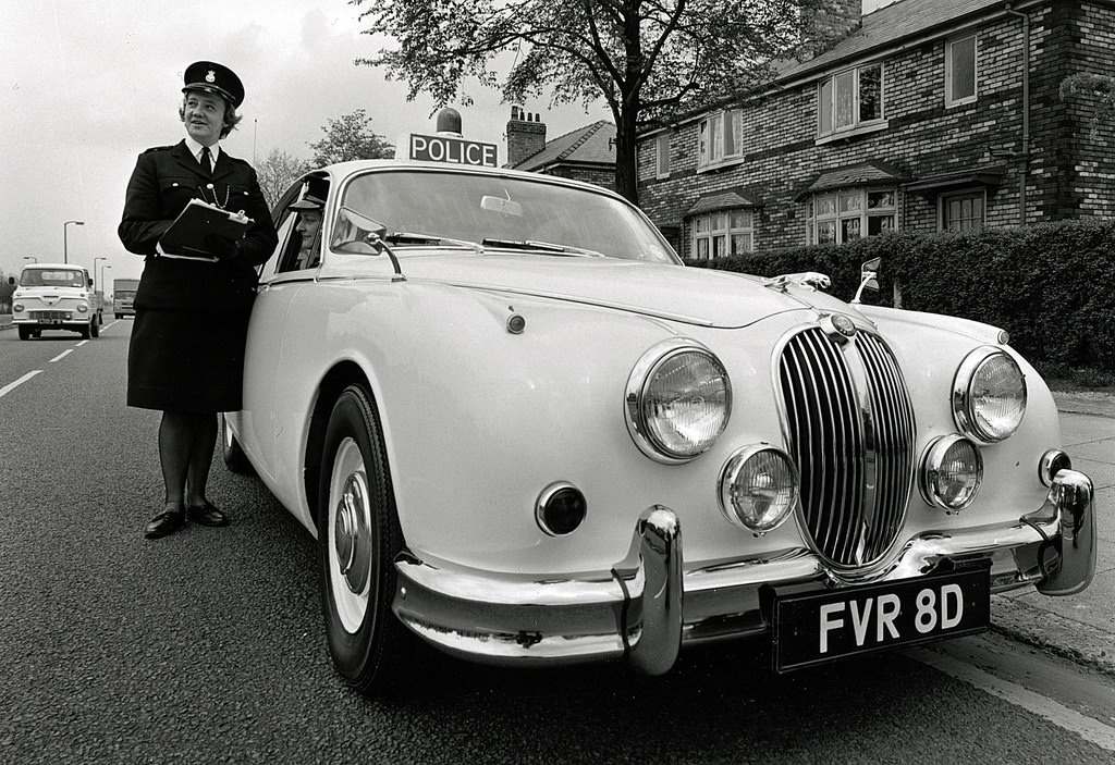 Classic Jaguar in South Manchester streets, 1960s