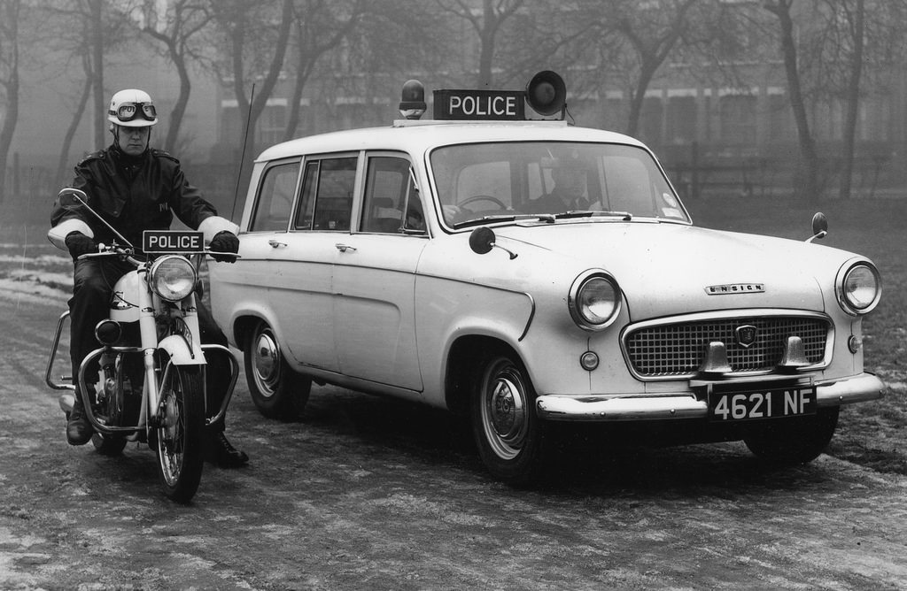 A Standard Ensign estate car and police motorcycle of the Manchester City Police fleet in 1962