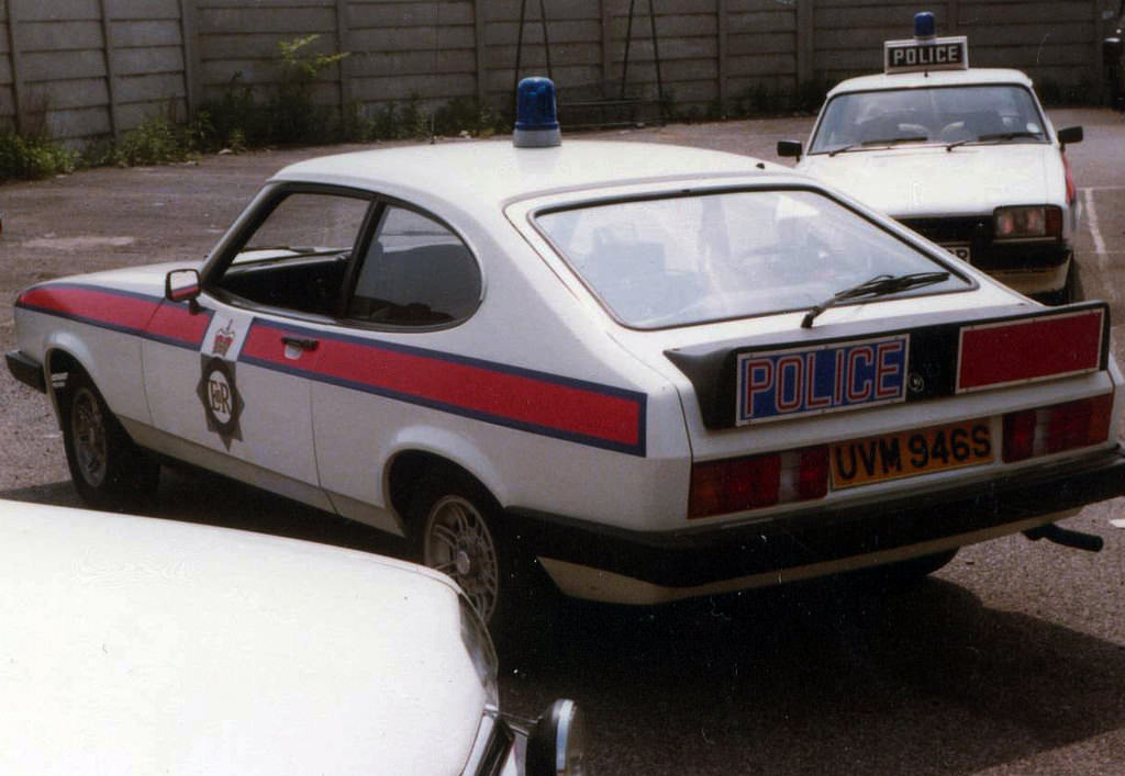 A Ford Capri sits in the yard of the Crescent Police Station in Salford during the late 1970s