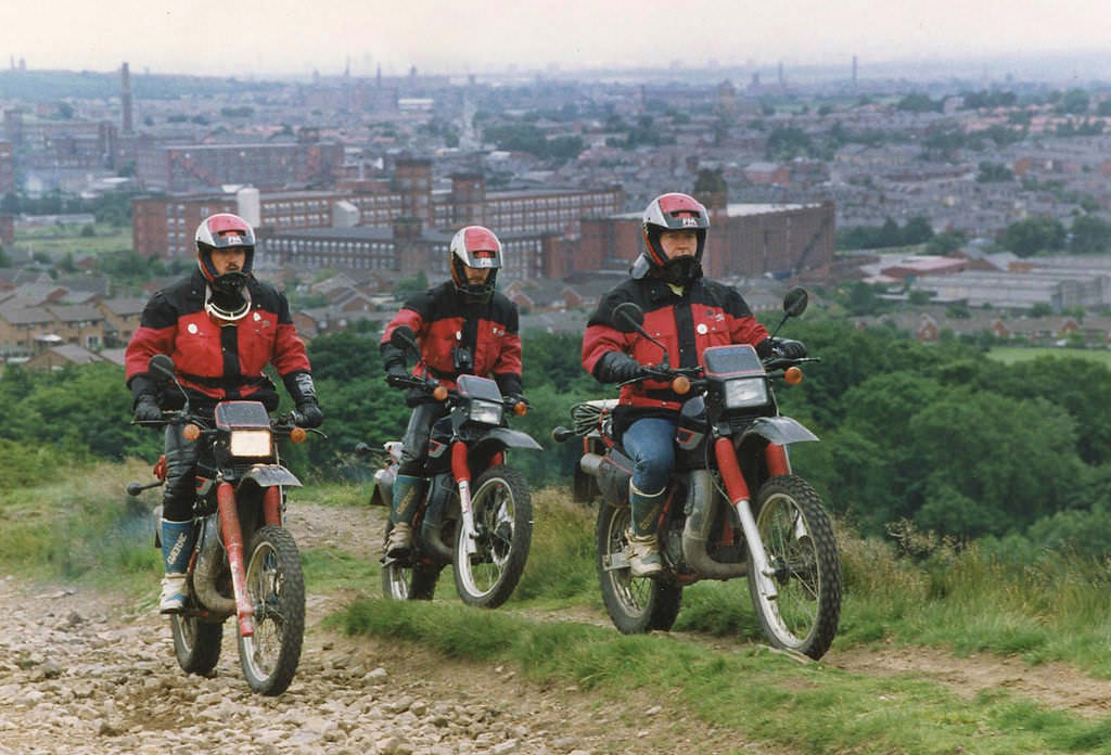 Greater Manchester Police officers patrol on off-road bikes from the early 1990s