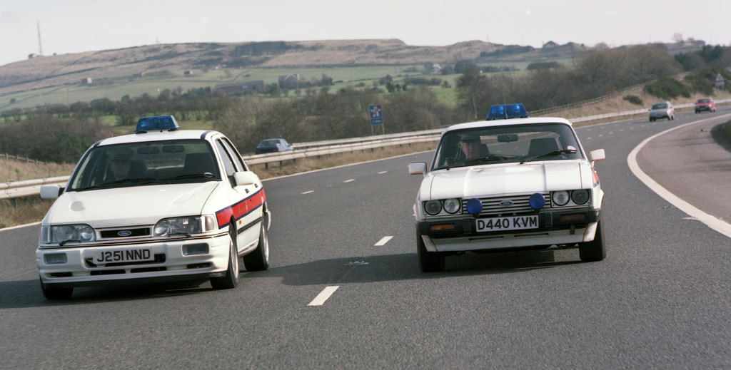 The last Ford Capri to see service with Greater Manchester Police alongside the Ford Sierra Cosworth that replaced it on Monday, 13 April, 1992