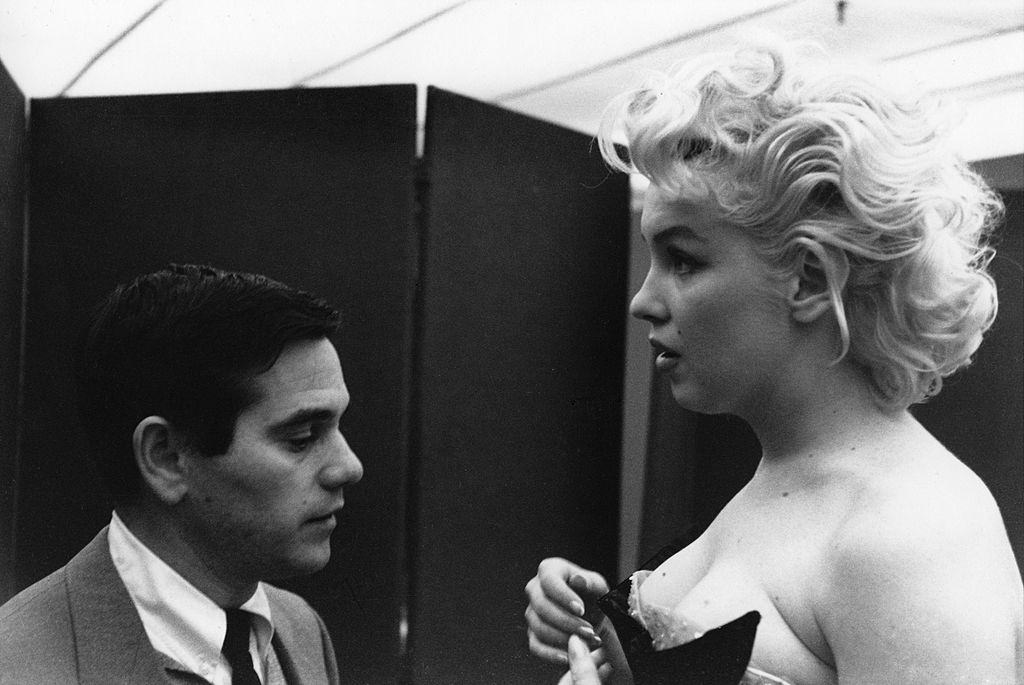Marilyn Monroe in the dressing room where she is getting ready.