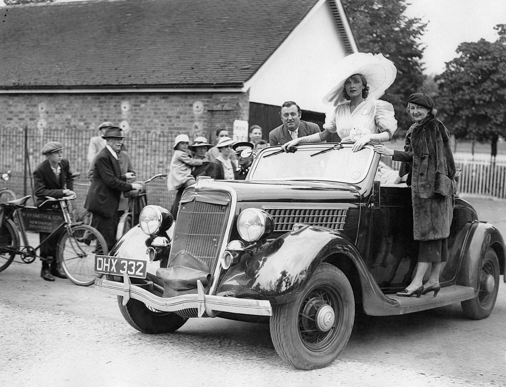 Marlene Dietrich at her arrival for the film shooting of "Knight without armour" in Ascot, England, 1920s.