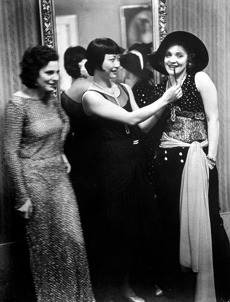 Marlene Dietrich with leni Riefenstahl and Anna May at Pierre Ball, 1928.