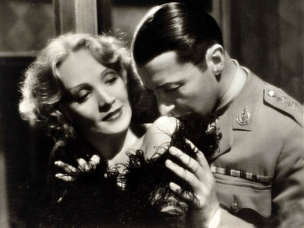 Marlene Dietrich with actor Clive Brook in the movie 'The Blue Angel', 1930.