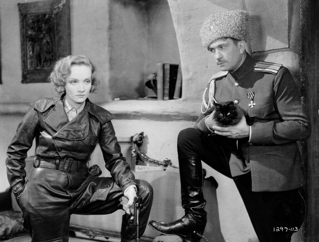 Marlene Dietrich as Marie Kolverer and Victor McLaglen as Colonel Kranau in a scene from the film 'Dishonoured', 1931.