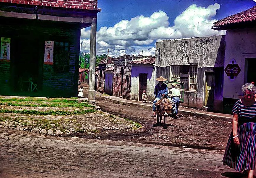 Burro and Coca-Cola on the streets of Mexico between 1955 and 1957