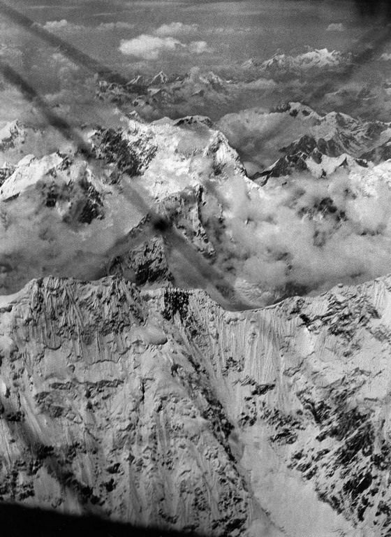 The expedition flies over Kanachenjunga, the third highest mountain in the world.