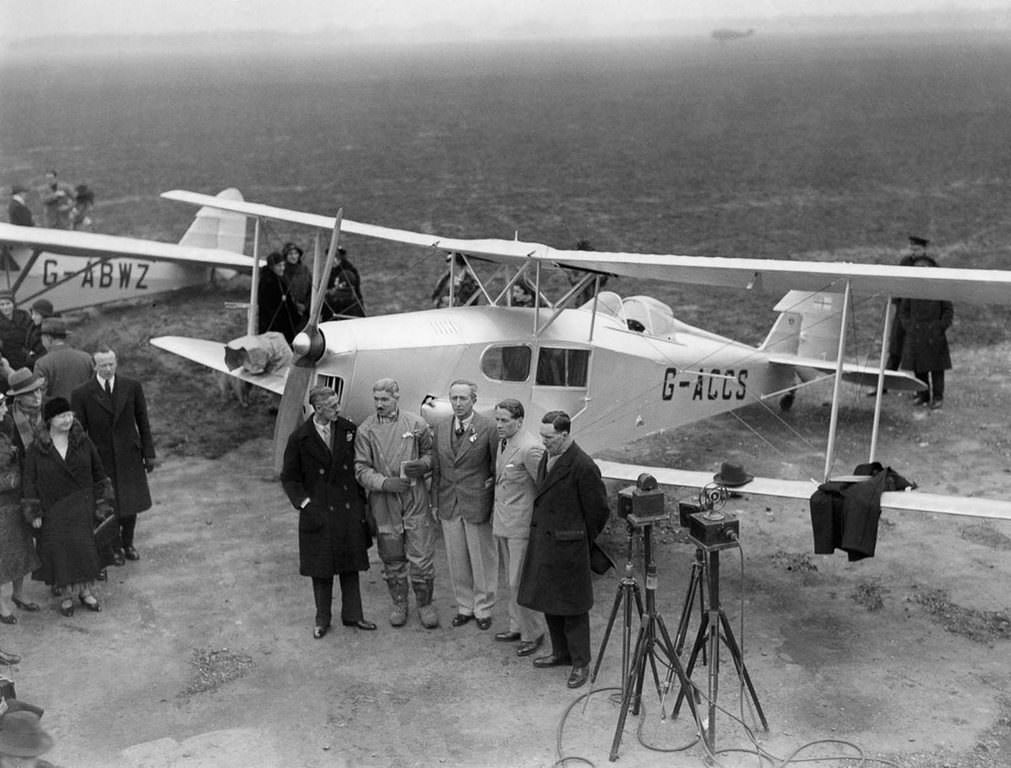 Expedition members give a statement before departing London.