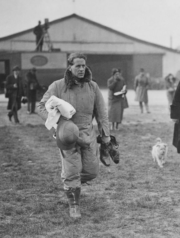 Lord Clydesdale heads to his plane as the expedition sets out from England.