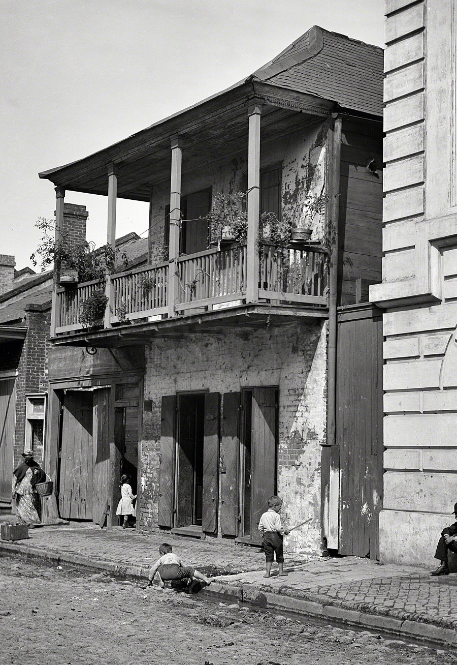 Street in the French Quarter, New Orleans circa 1880s-1890s.