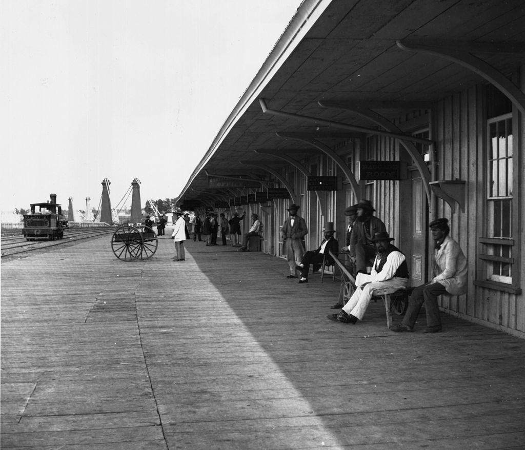 Passengers waiting at the Clifton Depot on the Great Western Railway, 1860s.