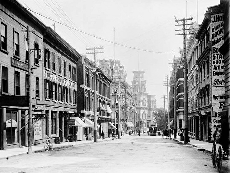 Elgin St. from Wellington with the City Hall on the left background, 1890s