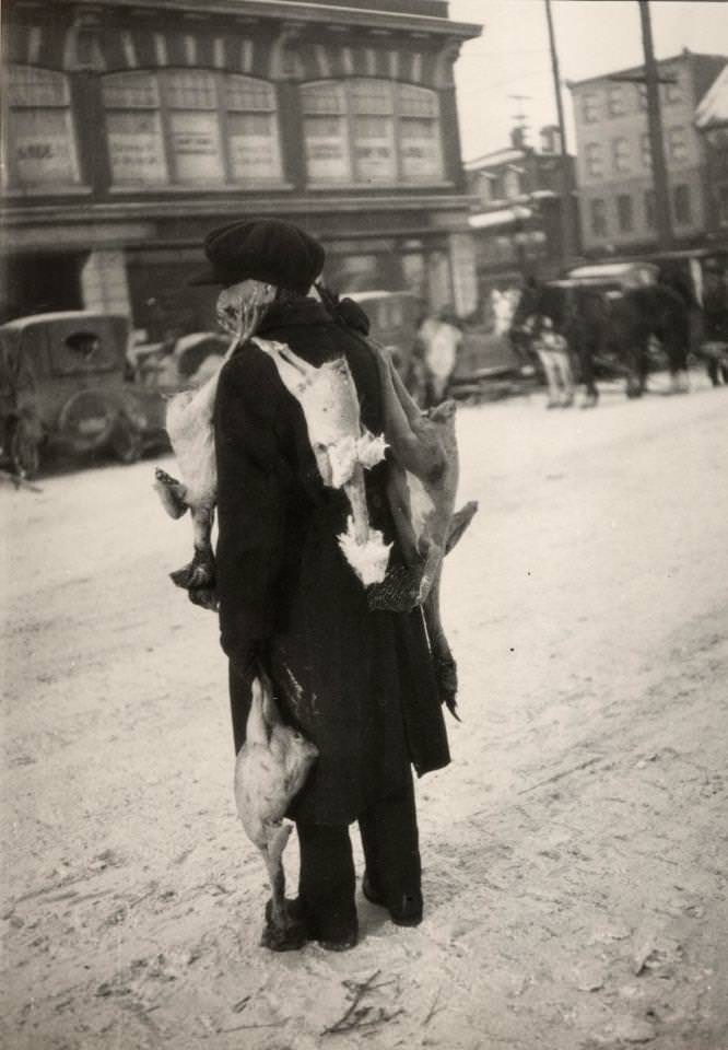 Chicken vendor in the market on York St., Ottawa, 1899