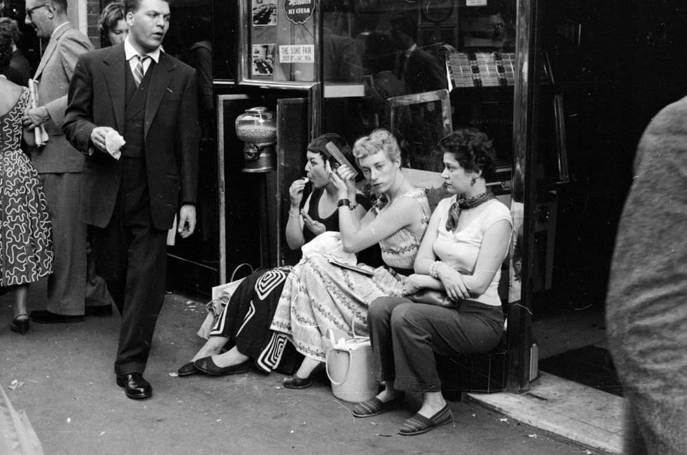 A group of young women ‘hanging out’ on the streets of Soho, London in 1956.