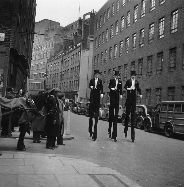 A view down along the shops, cafes and bars from the junction of Old Compton Street and Frith Street in London’s Soho in 1959.