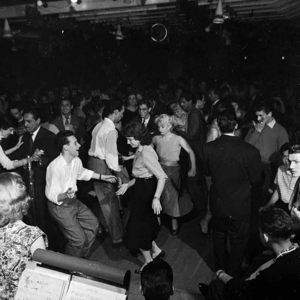 Londoners enjoy the Soho nightlife in 1956.