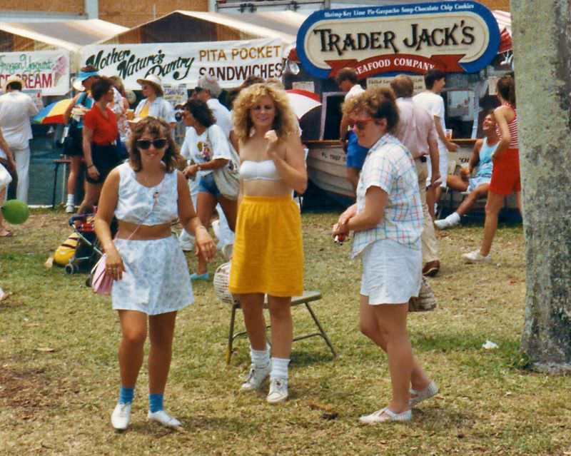 Women by food booths, SunFest, 1988