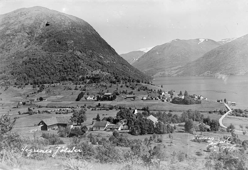 View of Ålhus, Jølster. The vicarage and church in front, and the Hegrenes farms in the background.