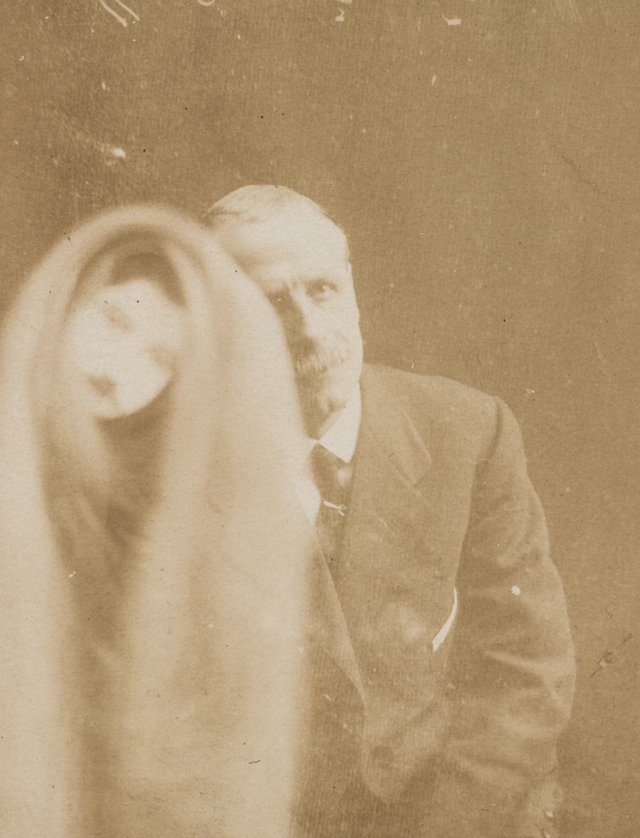 The alleged face of a long-dead work colleague appears over a portrait of a man.