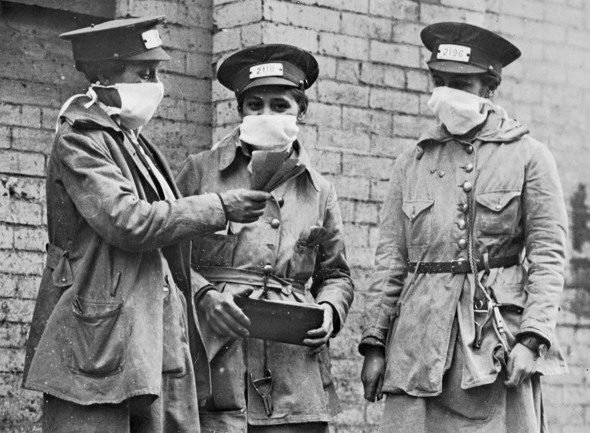 New York City ‘conductorettes’ wear masks, on October 16, 1918