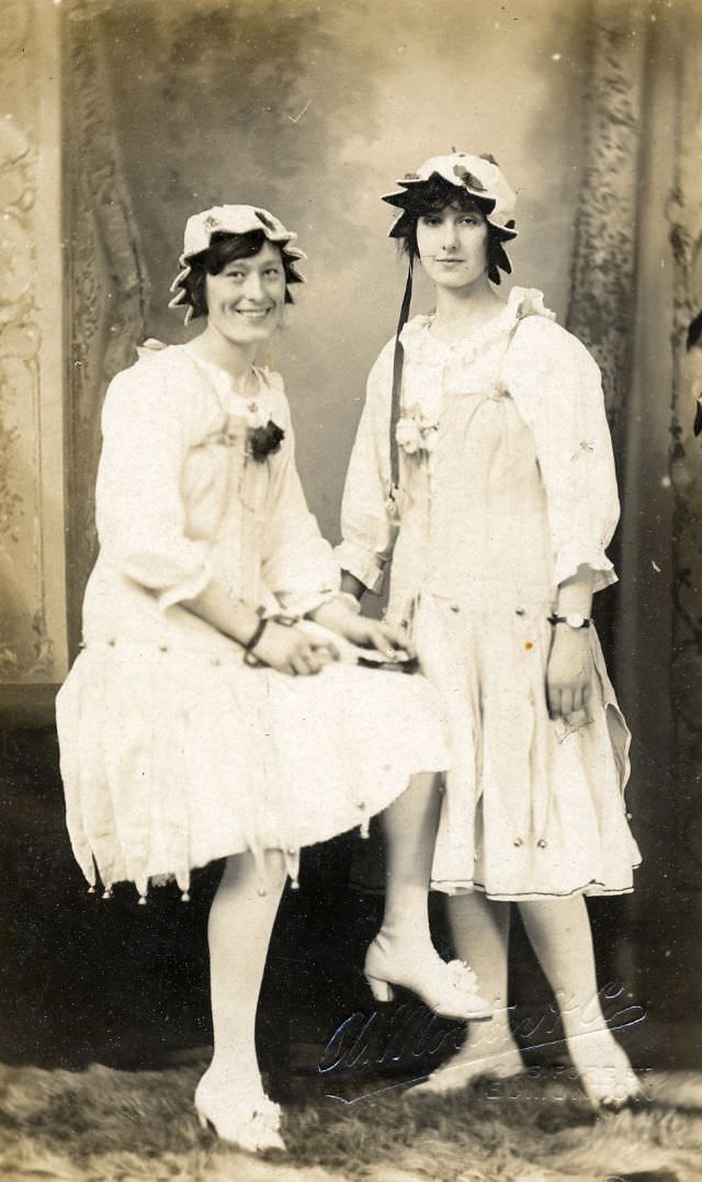 Two girls dressed up as rose buds