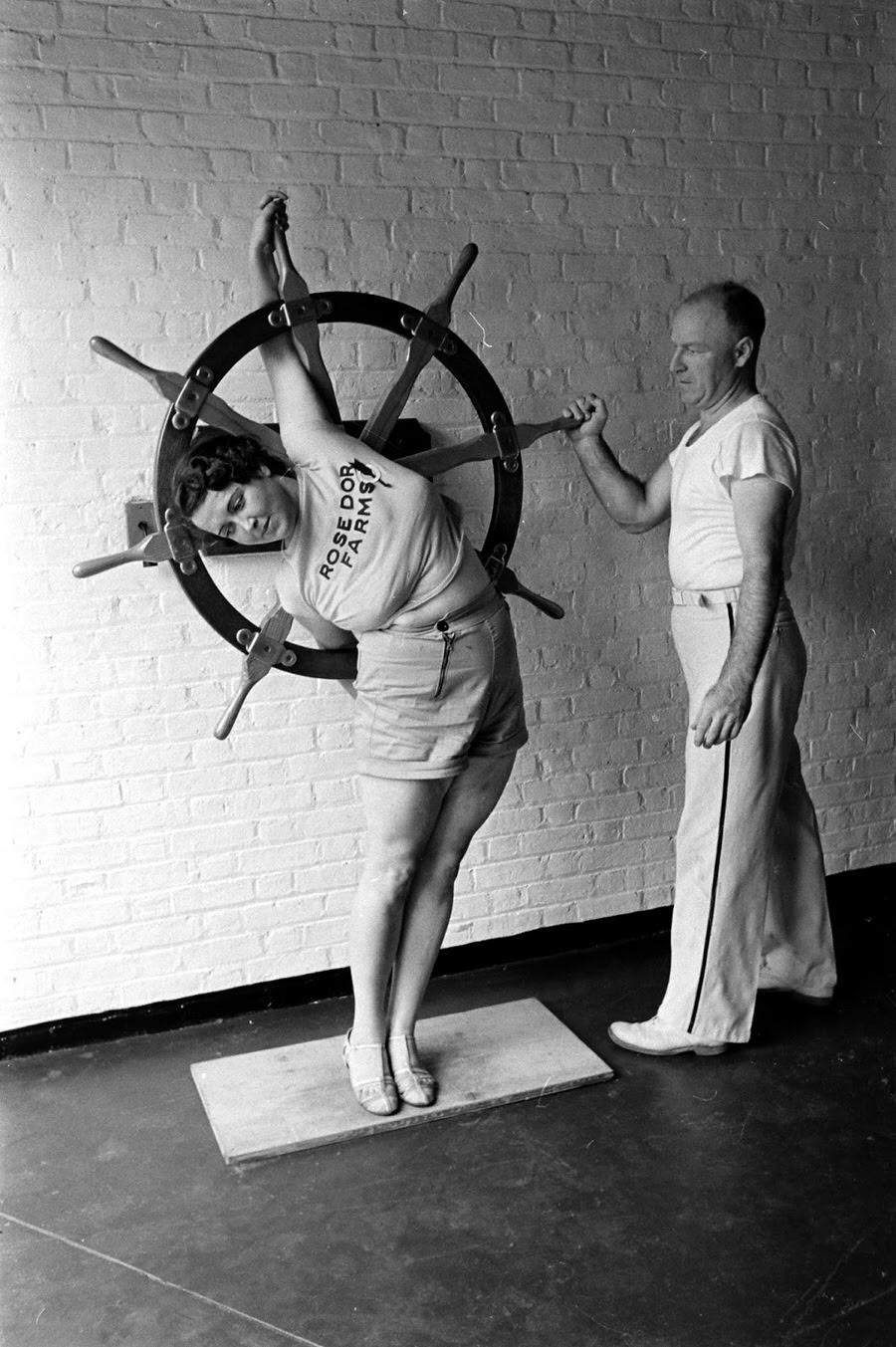 Exercise and stretching include use of a ship's steering wheel.