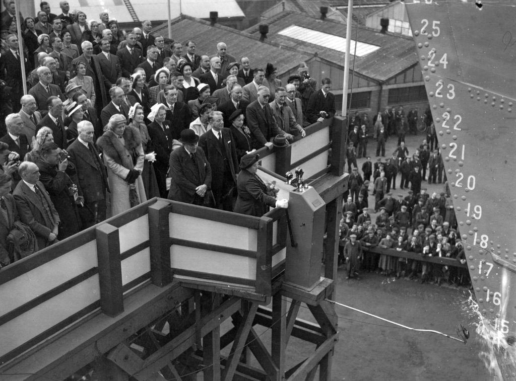 Lady Mitchell, wife of the Major General Sir Philip Mitchell, launching the Union Castle liner 'Kenya Castle' at the Harland and Wolff shipyard in Belfast, 1951.