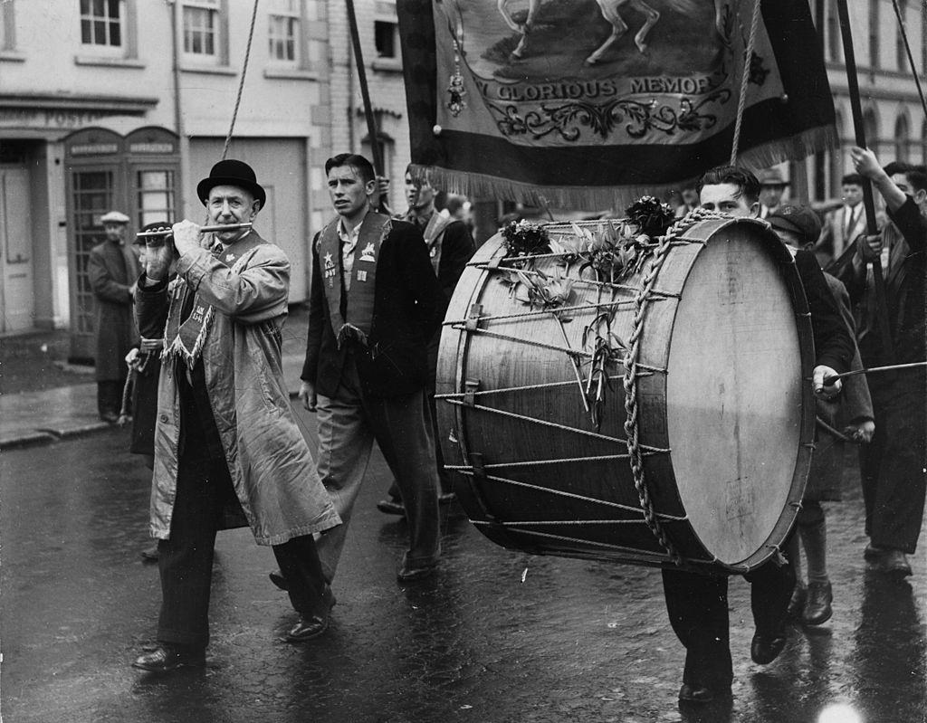 A flautist and lambeg drummer marching with their Orange Lodge in Belfast, 1951.