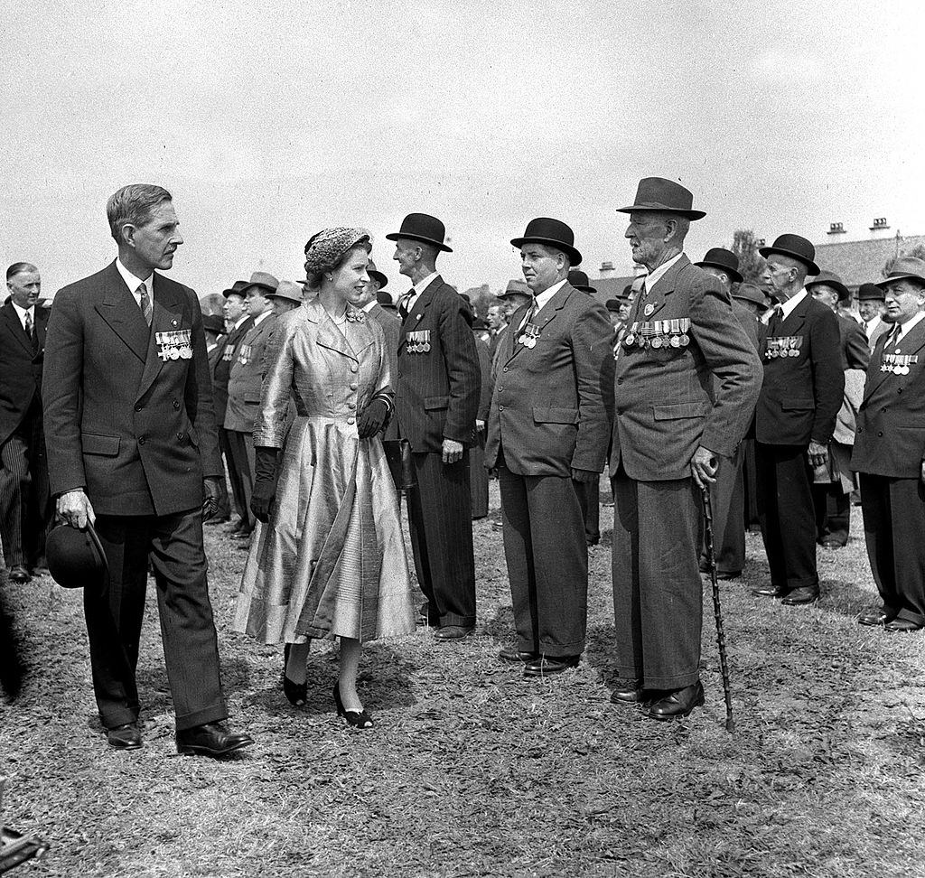 Queen Elizabeth II reviewing ex-servicemen at Balmoral, Belfast, 1953.