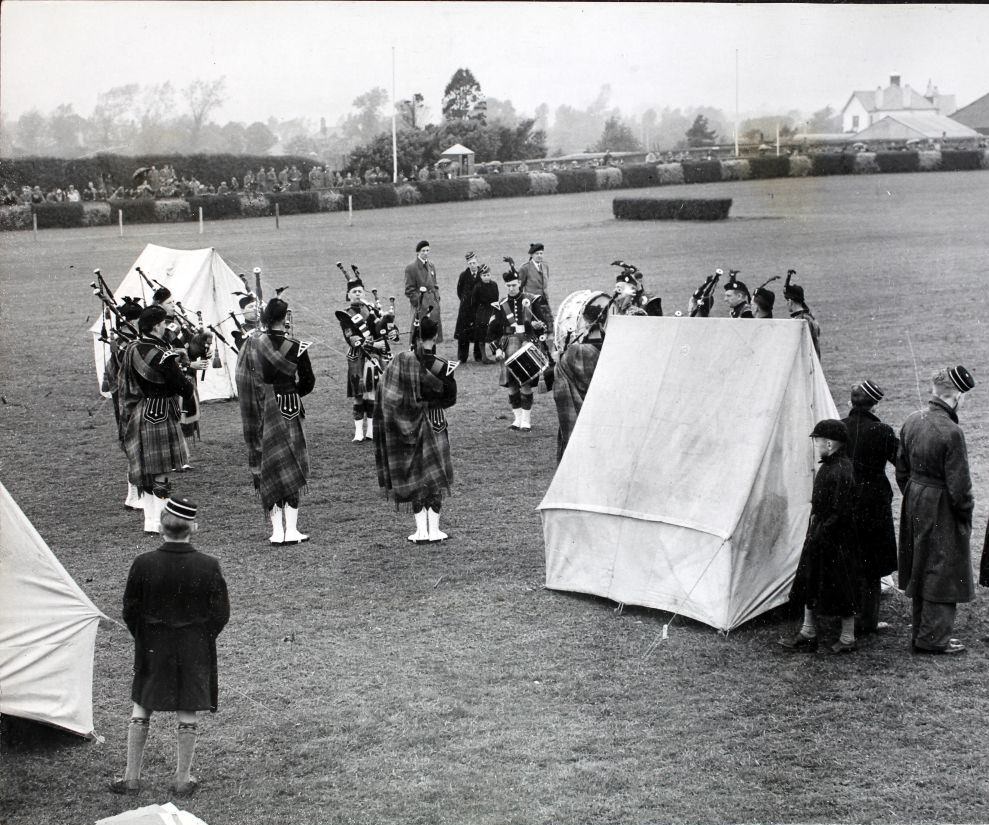 Contestants playing their bagpipes at the European Pipe Bands Championship in Belfast, 1953.