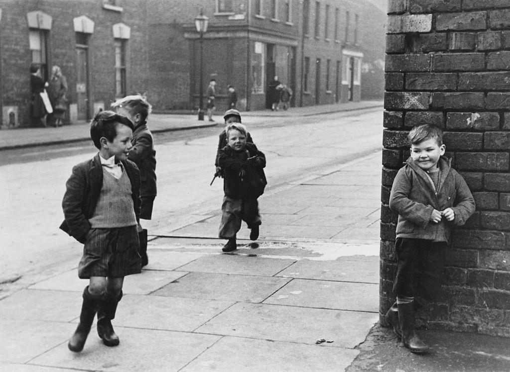 A group of cheeky children playing in the streets of Belfast, 1954.