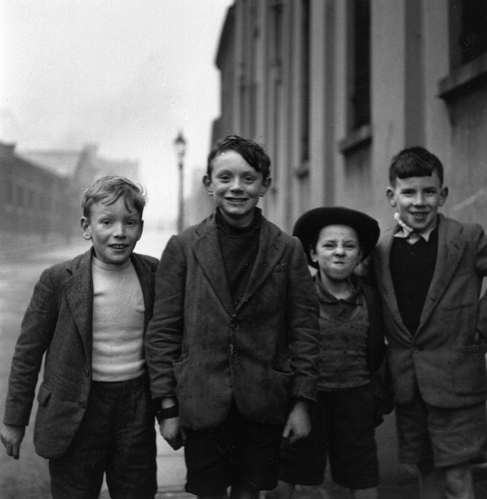 A group of young Belfast boys playing in the street, 1954.