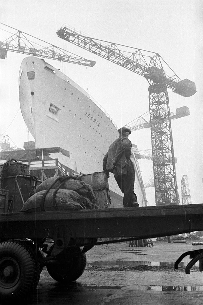 A delivery of supplies to the Harland and Wolff ship yard in Belfast where a liner is being built, 1954.