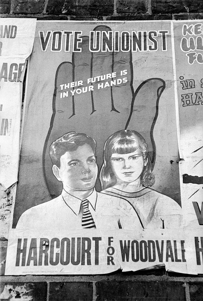 A Unionist poster on a wall in Belfast urging people to voate for candidate Harcourt, 1954.