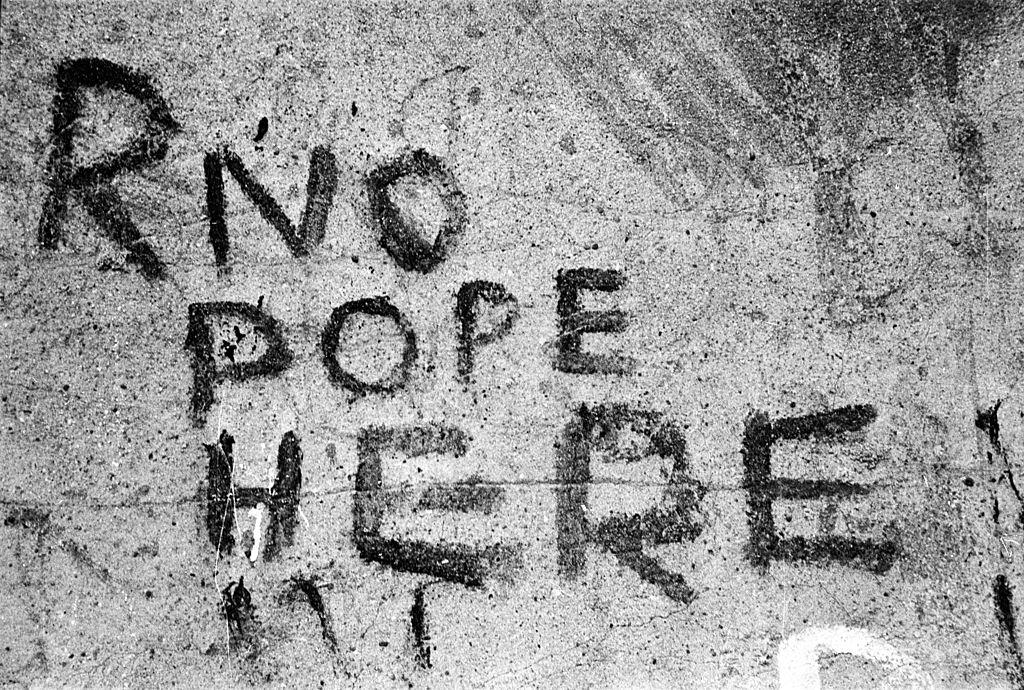 A unionist slogan spray painted on a wall in Belfast reading 'No Pope Here', 1954.