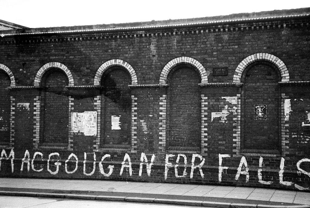 A spray painted election message on a wall in Belfast referring to Falls Road, 1954.