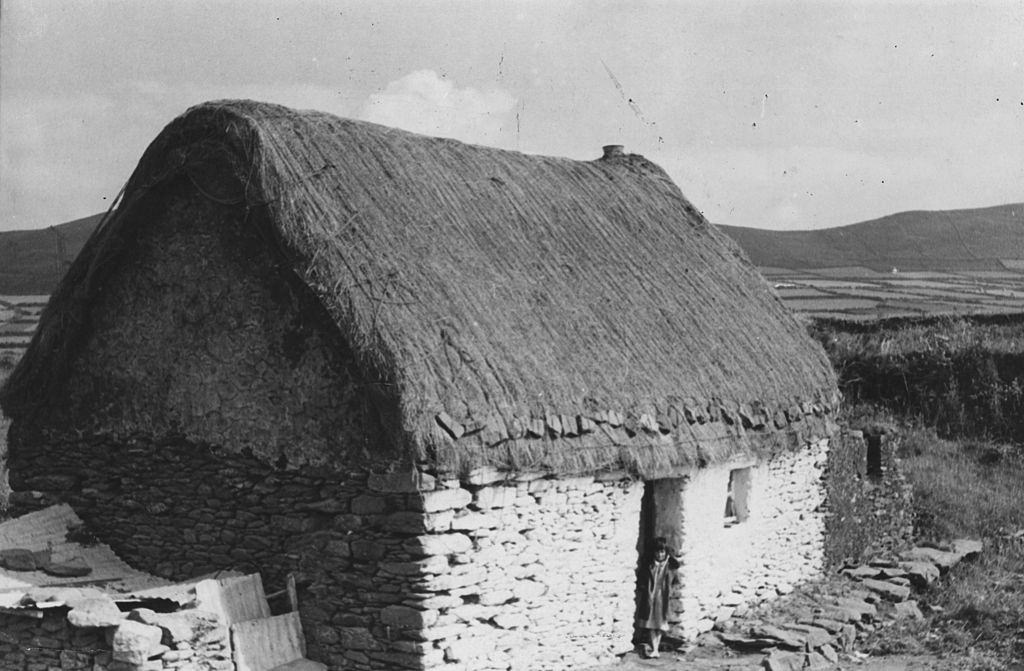 The exterior of a typical Irish cottage near Belfast, 1955.