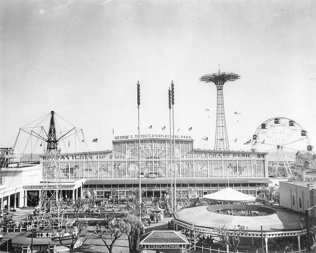 General view of rides at Steeplechase Park, Coney Island, New York City, 1950.