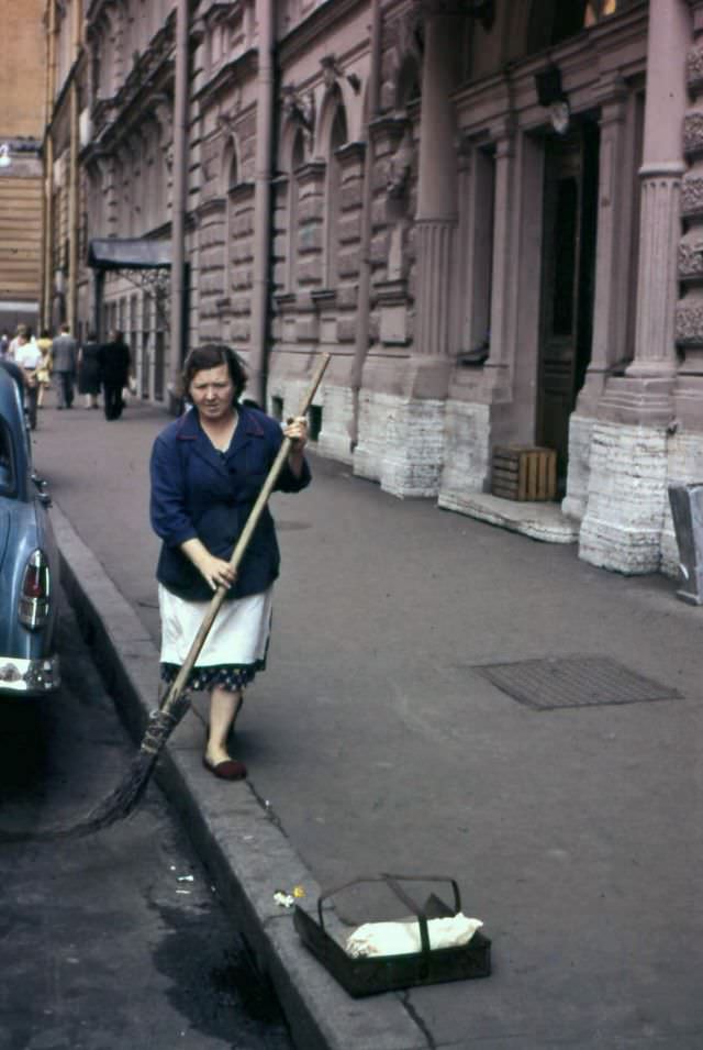 A woman cleaning streets