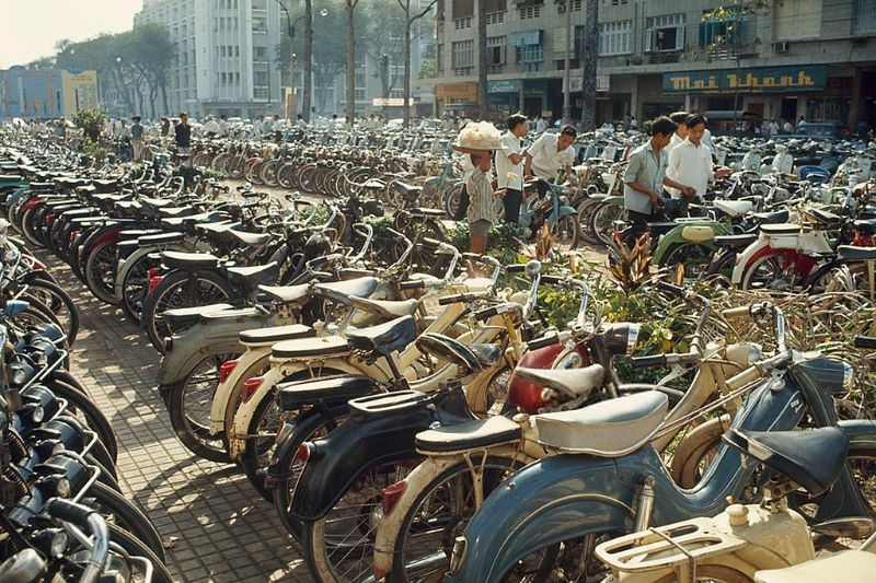 Rows of bicycles clutter a downtown parking area in Saigon, 1965