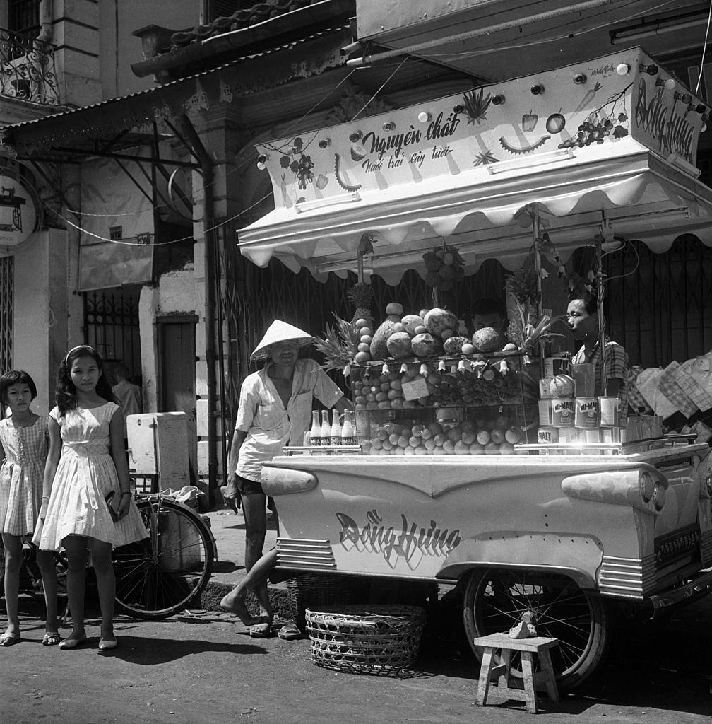 Salesman of ice cream in Cholon, 1961.