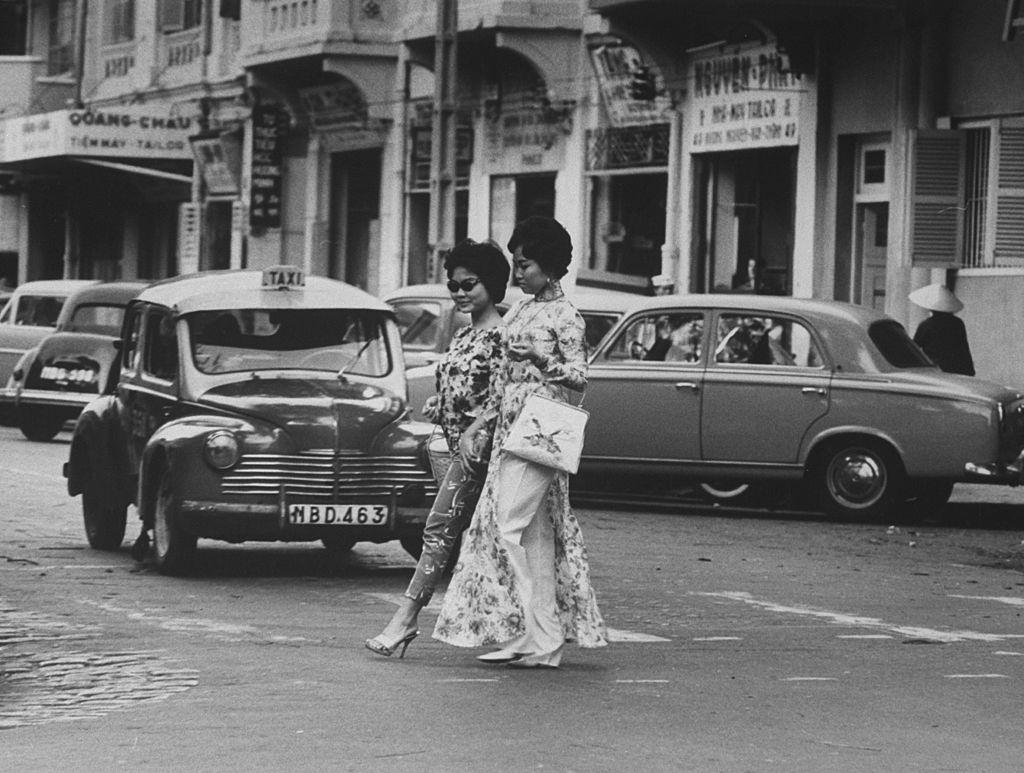 Vietnamese women crossing the street, 1961.
